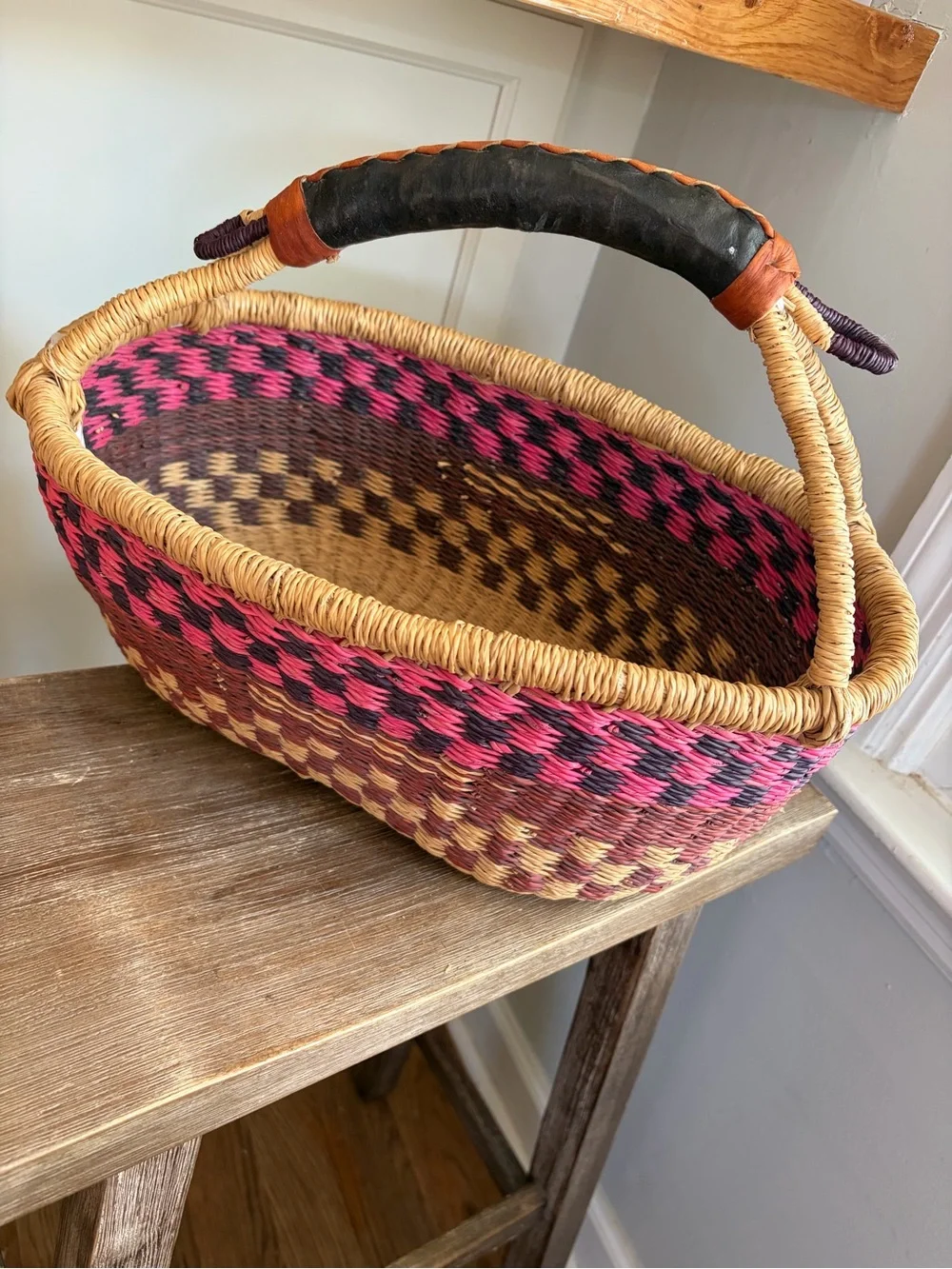 African Handwoven Ghanaian Straw Basket with Leather Handle pink red beige
